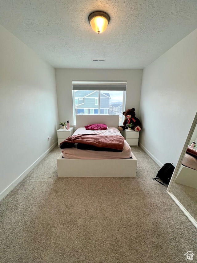 3457 W Hamm Ln, Herriman, UT 84096 - bedroom with carpet, a textured ceiling, and baseboards