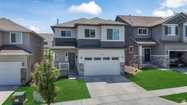 3457 W Hamm Ln, Herriman, UT 84096 - view of front of property with stone siding, stucco siding, and driveway