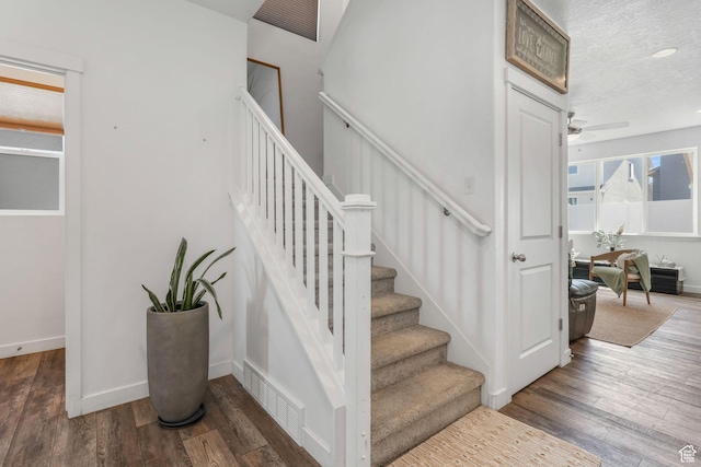 3457 W Hamm Ln, Herriman, UT 84096 - staircase with wood finished floors, ceiling fan, and baseboards