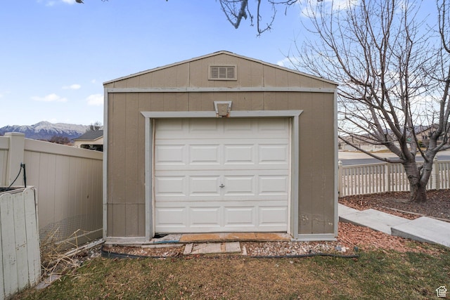 garage featuring a mountain view