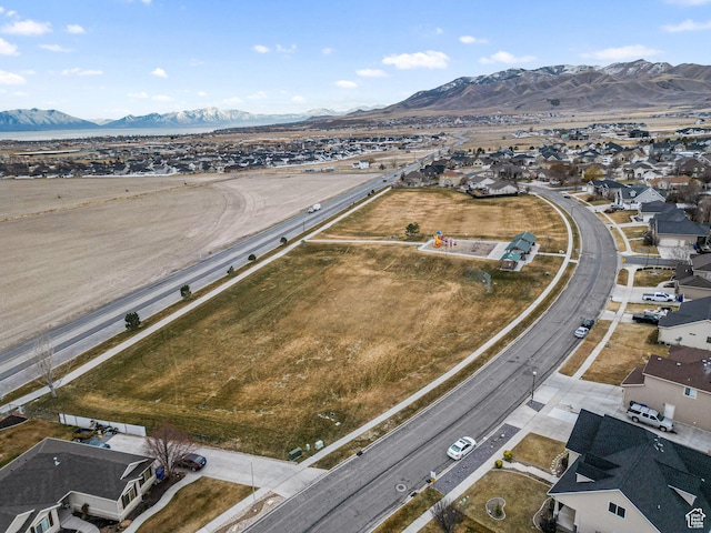 drone / aerial view featuring a mountain view