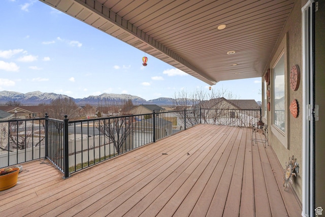 wooden terrace featuring a mountain view