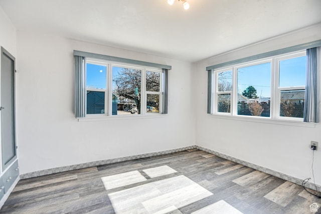 empty room with light wood-type flooring