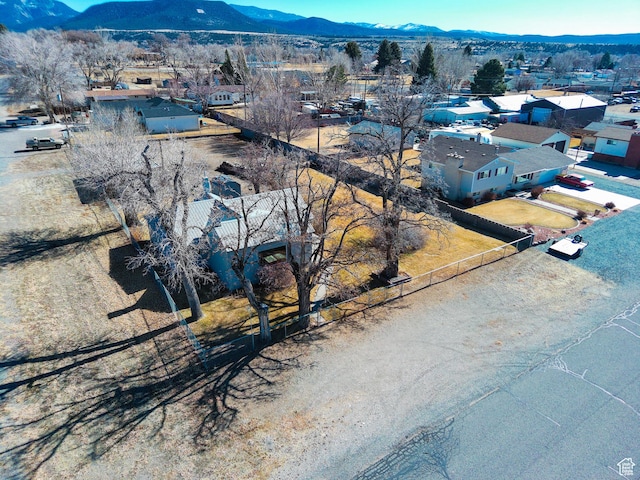 birds eye view of property featuring a mountain view