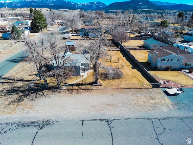 drone / aerial view featuring a mountain view