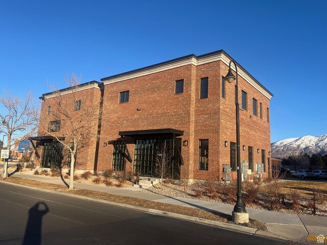 10131 N Redwood, Cedar Hills, UT 84062 - view of building exterior with a mountain view