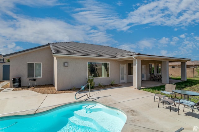 3274 W 2530 S, Hurricane, UT 84737 - rear view of property featuring a fenced in pool, central air condition unit, and a patio area