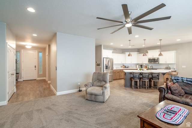 3274 W 2530 S, Hurricane, UT 84737 - living room featuring light colored carpet and ceiling fan