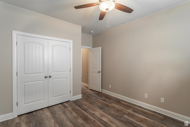 3274 W 2530 S, Hurricane, UT 84737 - unfurnished bedroom featuring dark hardwood / wood-style floors, a textured ceiling, ceiling fan, and a closet
