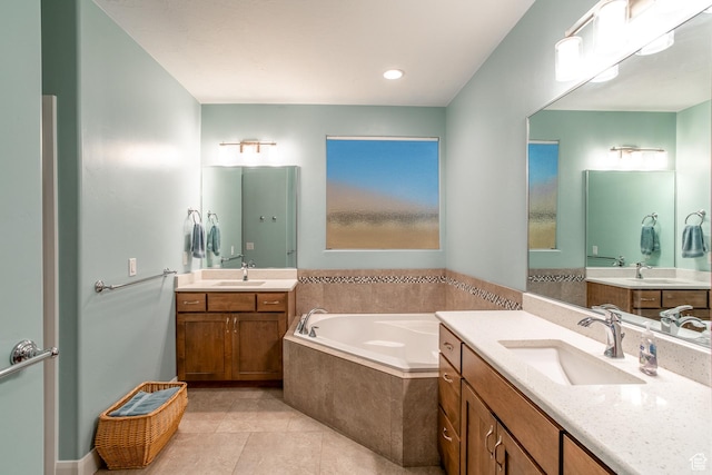 3274 W 2530 S, Hurricane, UT 84737 - bathroom featuring a relaxing tiled tub, vanity, and tile patterned floors