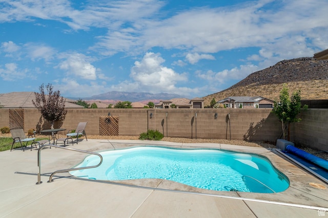 3274 W 2530 S, Hurricane, UT 84737 - view of swimming pool featuring a mountain view and a patio