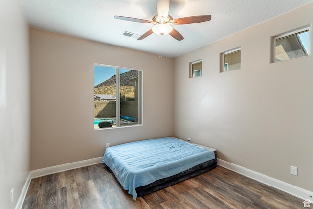 3274 W 2530 S, Hurricane, UT 84737 - bedroom with dark wood-type flooring and ceiling fan
