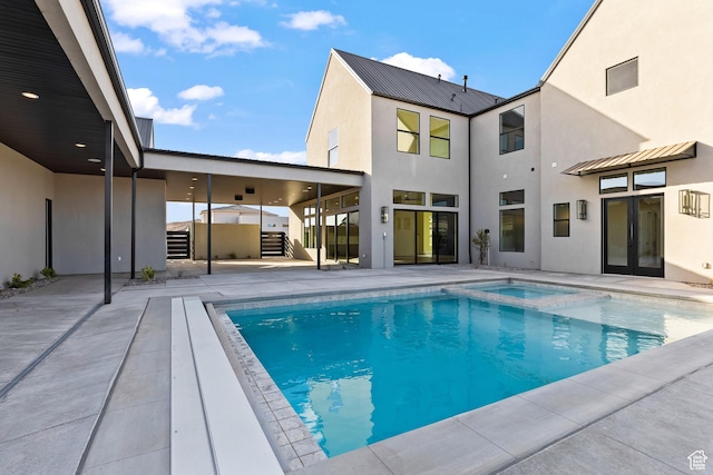 view of swimming pool with a patio