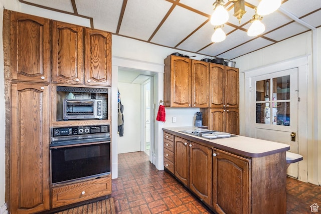 390 E Center St, Spanish Fork, UT 84660 - kitchen with an inviting chandelier, oven, and stainless steel gas cooktop