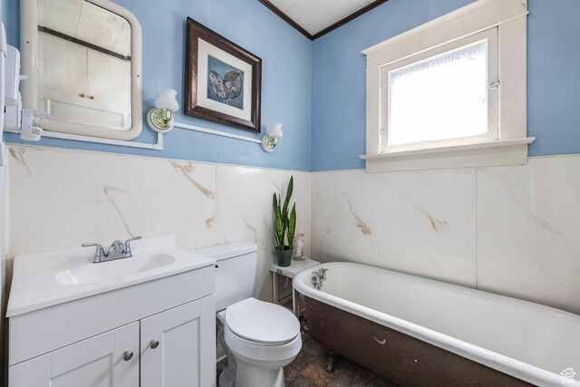 390 E Center St, Spanish Fork, UT 84660 - bathroom with tile walls, vanity, ornamental molding, toilet, and a bath