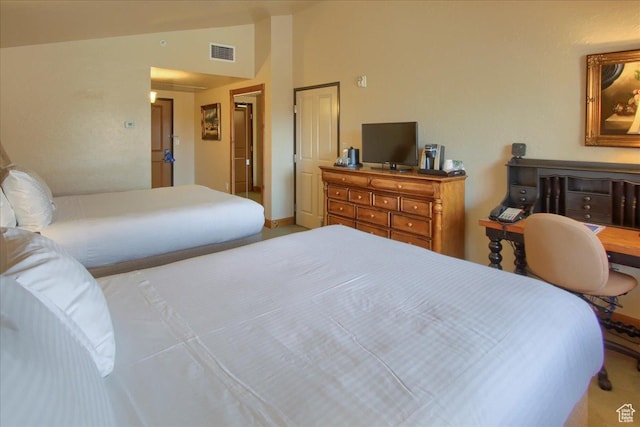 bedroom with vaulted ceiling