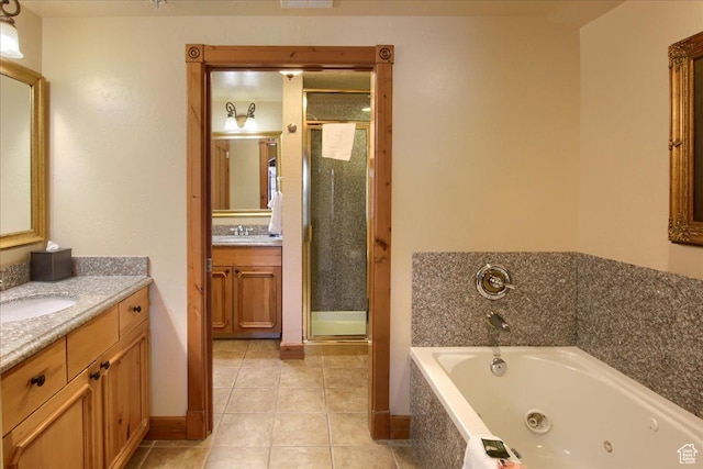 bathroom featuring vanity, plus walk in shower, and tile patterned flooring
