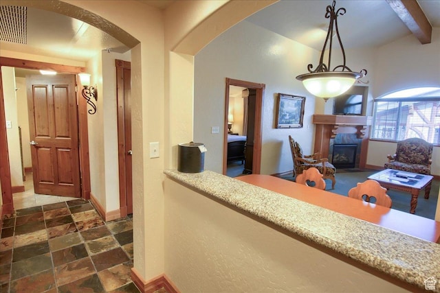 reception area with a tiled fireplace