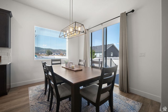 1712 S 1160 E, Heber City, UT 84032 - dining room with dark wood-type flooring and a notable chandelier