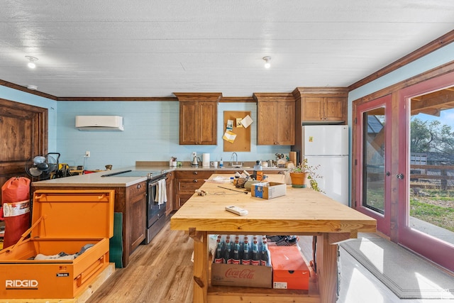 361 N 100 W, Holden, UT 84636 - kitchen with stainless steel electric stove, an AC wall unit, white refrigerator, crown molding, and light wood-type flooring