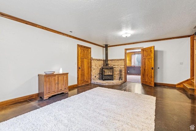 361 N 100 W, Holden, UT 84636 - living room featuring crown molding, a textured ceiling, and a wood stove