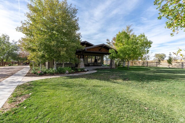 exterior space featuring a front lawn