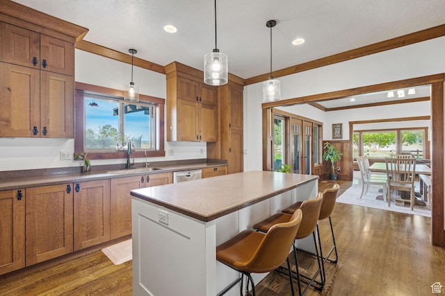 361 N 100 W, Holden, UT 84636 - kitchen with a breakfast bar, sink, a center island, dishwashing machine, and pendant lighting