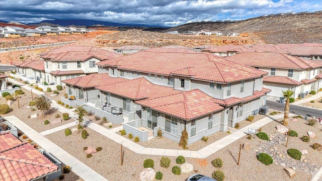 drone / aerial view featuring a mountain view