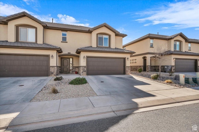 view of front of property featuring a garage