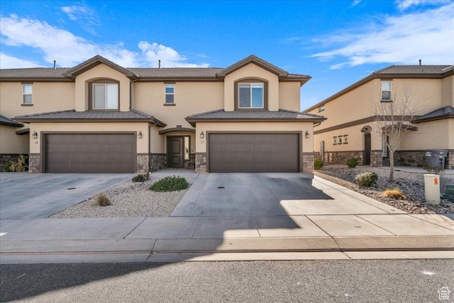 view of front of home with a garage
