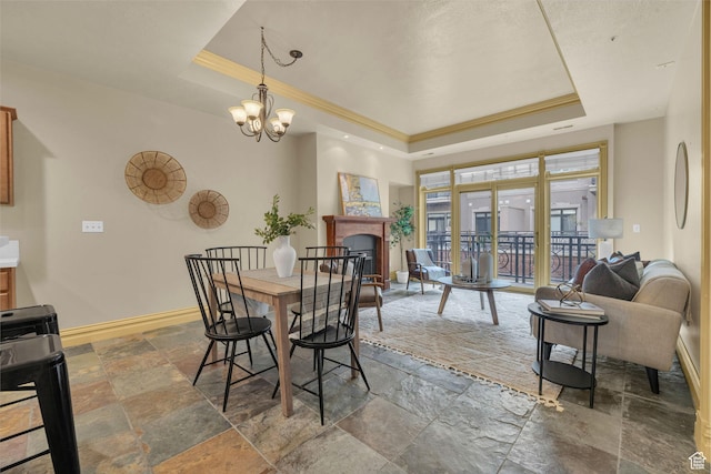 150 S 300 E Unit 202, Salt Lake City, UT 84111 - dining area with crown molding, a raised ceiling, and a chandelier