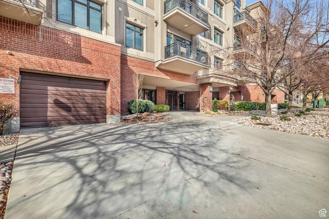 150 S 300 E Unit 202, Salt Lake City, UT 84111 - view of building exterior with a garage