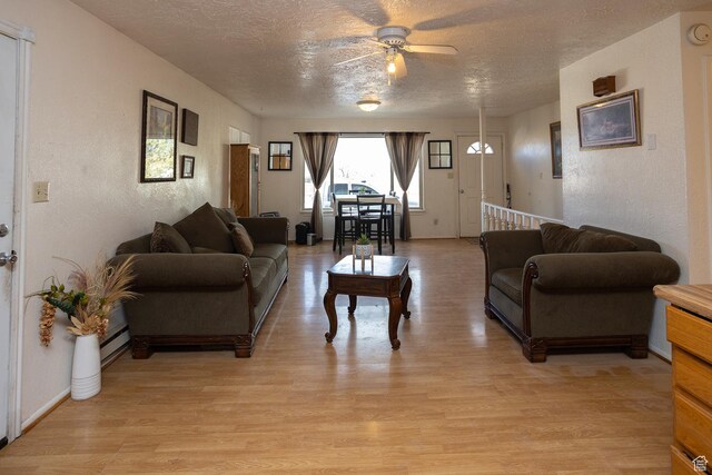 1904 N Rocky Ford Rd, Sigurd, UT 84657 - living room featuring ceiling fan, a textured ceiling, and light wood-type flooring