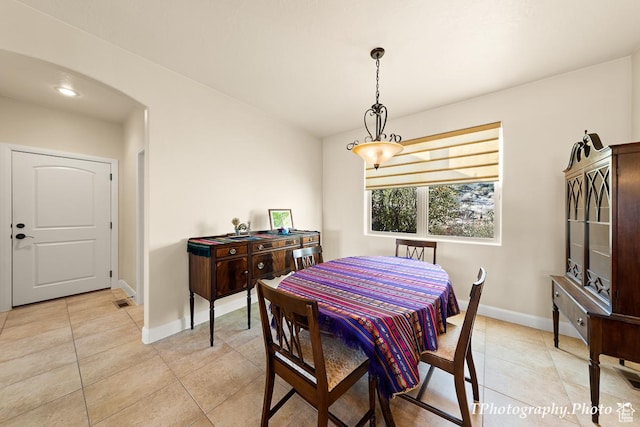 dining room featuring light tile patterned floors