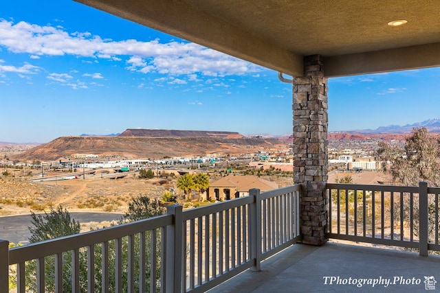 balcony featuring a mountain view