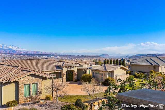mediterranean / spanish-style home featuring a mountain view