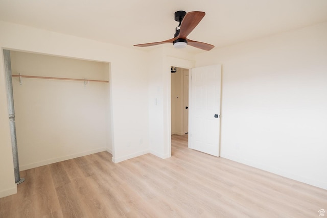 1898 N Rocky Ford Dr, Sigurd, UT 84657 - unfurnished bedroom with light wood-style flooring, a closet, baseboards, and ceiling fan