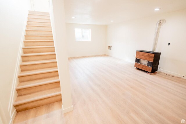 1898 N Rocky Ford Dr, Sigurd, UT 84657 - below grade area featuring stairs, wood finished floors, recessed lighting, and baseboards