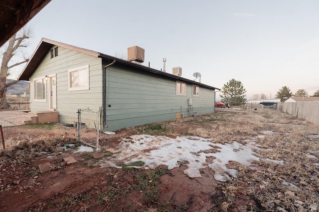 1898 N Rocky Ford Dr, Sigurd, UT 84657 - view of side of property with a chimney and fence