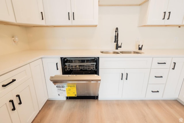 1898 N Rocky Ford Dr, Sigurd, UT 84657 - kitchen with a sink, light wood finished floors, and white cabinets