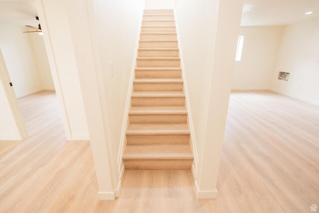 1898 N Rocky Ford Dr, Sigurd, UT 84657 - stairway with wood finished floors, ceiling fan, and baseboards