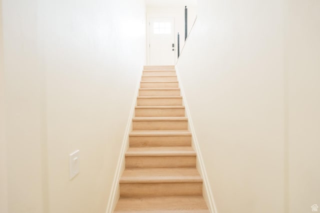 1898 N Rocky Ford Dr, Sigurd, UT 84657 - stairs with baseboards and wood finished floors