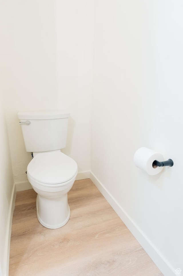 1898 N Rocky Ford Dr, Sigurd, UT 84657 - bathroom with baseboards, wood finished floors, and toilet
