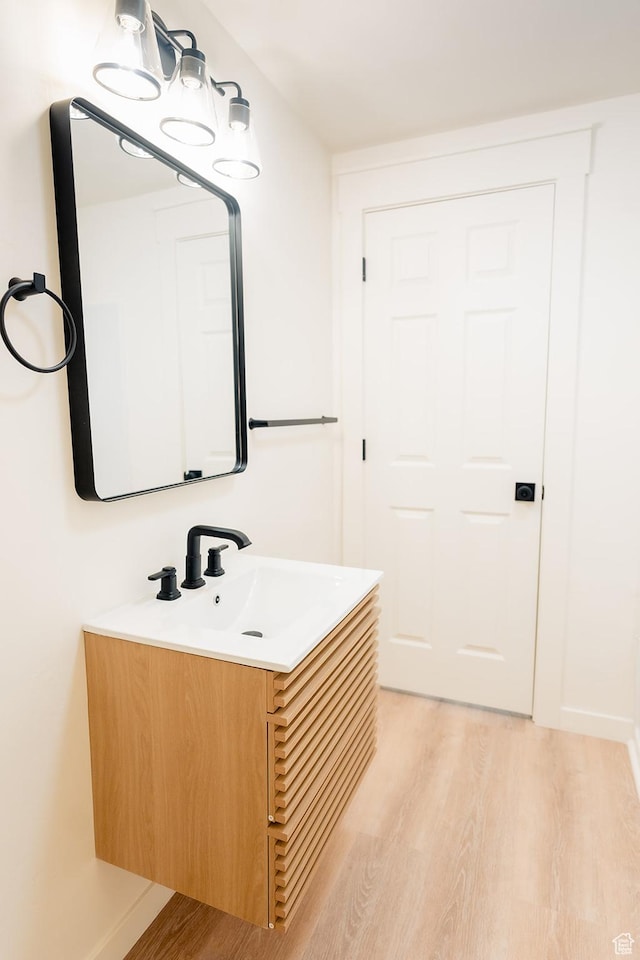 1898 N Rocky Ford Dr, Sigurd, UT 84657 - bathroom with wood finished floors and vanity