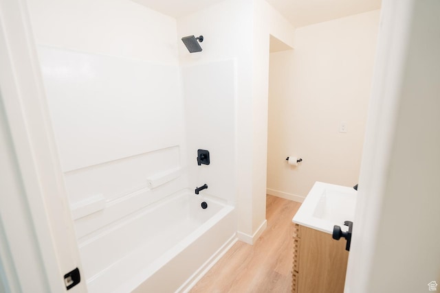 1898 N Rocky Ford Dr, Sigurd, UT 84657 - full bathroom with wood finished floors, washtub / shower combination, vanity, and baseboards