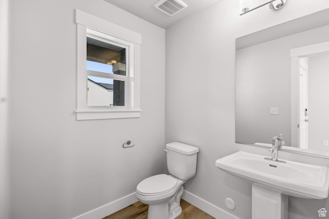 1246 W 575 S Unit 154, Logan, UT 84321 - bathroom with wood-type flooring, sink, and toilet
