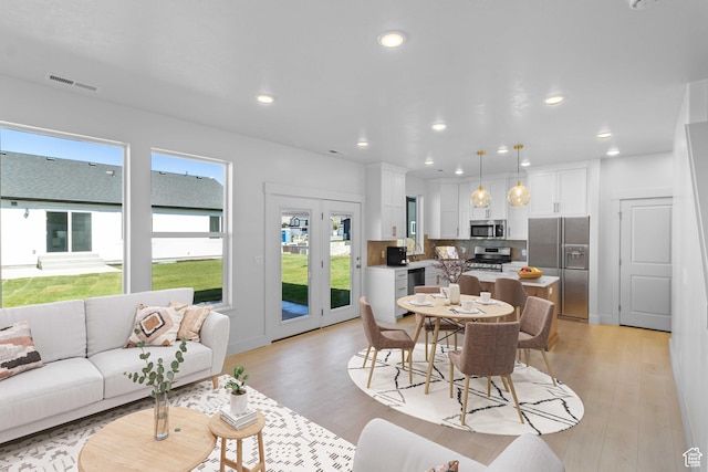 1246 W 575 S Unit 154, Logan, UT 84321 - dining area featuring light wood-type flooring