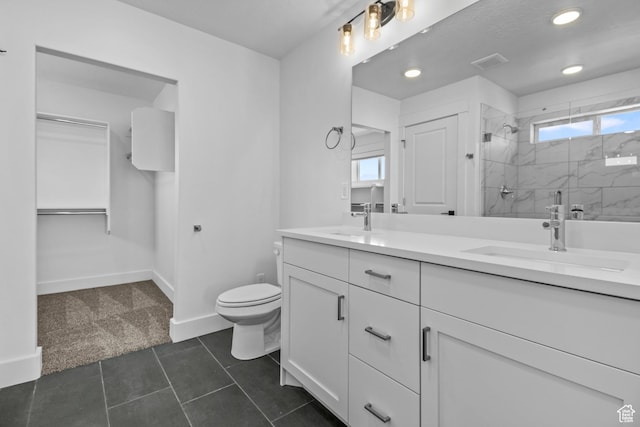 1246 W 575 S Unit 154, Logan, UT 84321 - bathroom with vanity, a wealth of natural light, toilet, and tiled shower