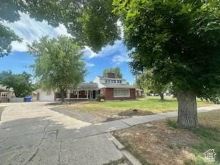 575 N 300 E, Tremonton, UT 84337 - view of front of house with a front lawn