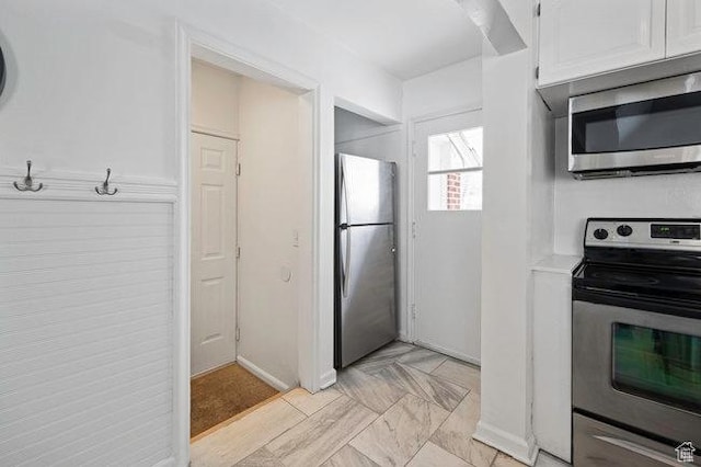 575 N 300 E, Tremonton, UT 84337 - kitchen with white cabinets, stainless steel appliances, and light countertops